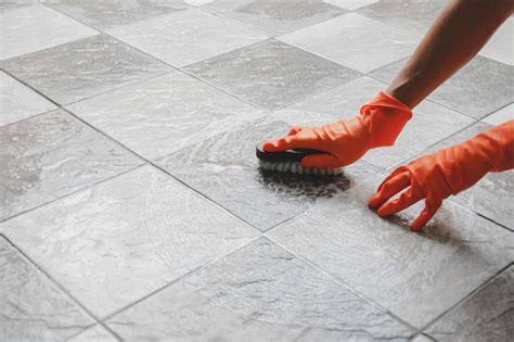 How to clean ceramic tile. First you will need to remove the floor finish to expose the tile and grout. Follow the steps below: Mix stripping products in accordance with the manufacturers’ recommended dilution ratio and apply a liberal amount of solution to the floor. Allow the solution to dwell, but do not allow it to dry. 