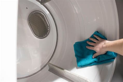 How to clean dryer. Rinse in a bowl of clean cool water. This step of the process will help remove any remaining soap from the fibers. Extract water from the fabric. Avoid wringing the water out of delicate garments when hand-washing. Instead, gently fold the garment so much of the water drips back into the bowl and then dry laying flat. 
