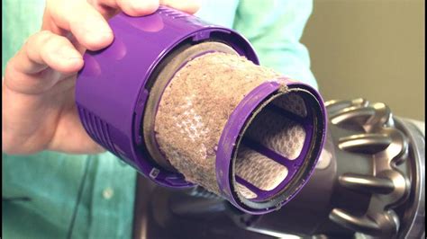 How to clean dyson filter. Step 1: Use the Filter Cleaning Brush. The first step in cleaning your air wrap filter is to use the filter cleaning brush. Pass the brush over the cable and stick it on the filter cage. Wiggle it around the Airwrap filter cage, this helps to remove all dirt or dust clinging to the outside of the cage. Use the Filter Cleaning Brush. 
