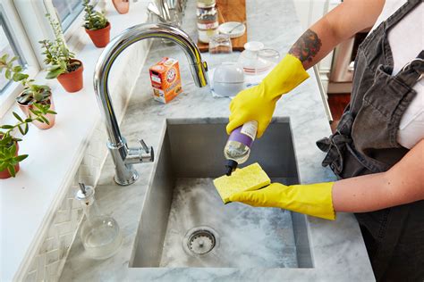 How to clean kitchen sink. Benjamin Franklin Plumbing shared the following biofilm prevention tips: Use baking soda to scrub mineral deposits. Use dental floss to clean under faucet handles. … 