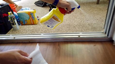 How to clean sliding door tracks. Clean the Glass. Photo: Serenethos/iStock/Getty Images. Mix a few drops of mild dish soap with water in your bucket. Dip your clean rag in the soapy water and wet the glass on your door, both inside and out. Wait a few minutes for the soap to dissolve any stuck-on dirt, then wipe off the soapy water from the top of … 