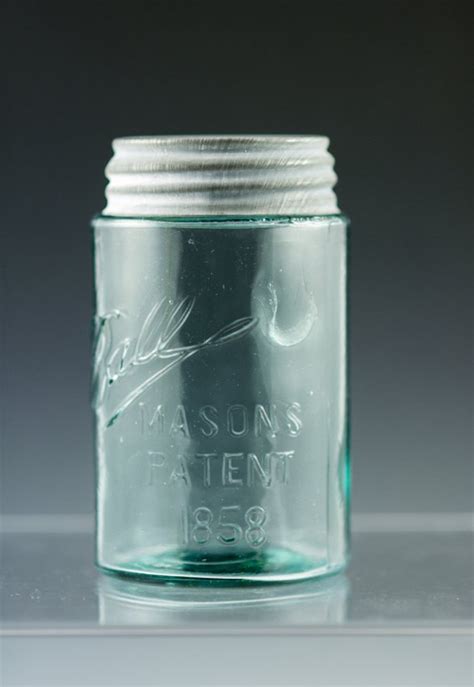 Hold the jar up to a light to check for any air bubbles in the glass, which would indicate that it is not an authentic Ball Mason jar. Look for the Ball logo on the bottom of the jar. If there is no logo, it is not an authentic Ball Mason jar. 5- Check the date on the bottom of the jar.. 