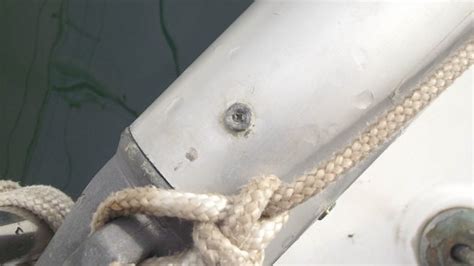 How to drill out and set rivets mending a broken spinnaker pole