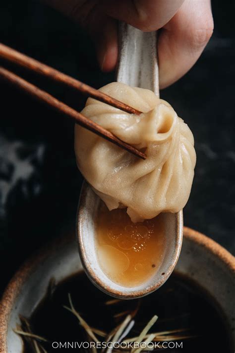 How to eat soup dumplings. Sheng Jian Bao—fried soup dumplings—while a ubiquitous breakfast food or snack in Shanghai for at least the last century, live in the shadow of their far more ... 