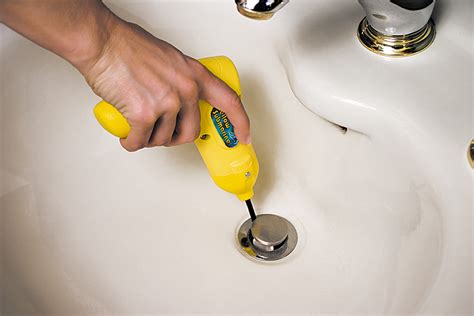 How to fix a clogged shower drain. Mix the cup of vinegar with a cup of baking soda and immediately pour the fizzing mixture down the drain. Allow this mixture of a cup of white vinegar and a cup of baking soda to rest in the pipes overnight, use a plunger to clear the block, and then flush the pipes with hot water. 3.) A Bent Wire Hanger. 