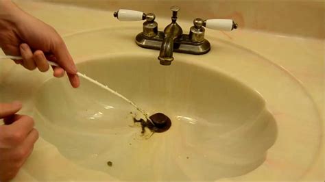 How to fix a slow draining sink. Jun 19, 2020 · If your kitchen sink drains slow or you dropped something down the drain and need to retrieve it, we can help! In this video we will demonstrate a slow drai... 