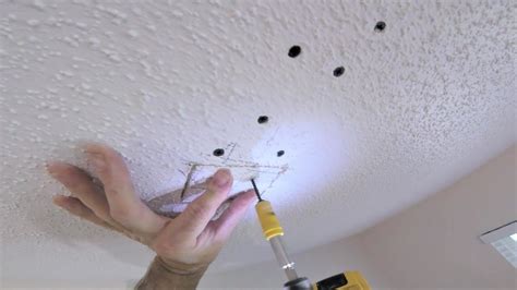 How to fix ceiling cracks. 2 Cover the crack with plaster compound. Scrape the plaster compound into the crack and flatten it on to the wall with your paint scraper. Once the compound is dry, lightly sand it until it is smooth. Dust the wall off and apply a second, slightly wider coat of plaster compound to the wall. Again, let the compound dry, sand it smooth and dust ... 