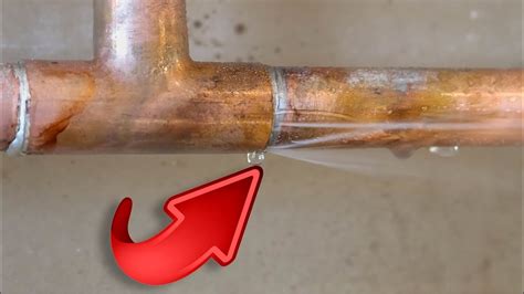 How to fix copper pipe leak. Light a BernzOmatic torch and place the flame directly onto the leaky joint. Allow the joint to heat up for a few minutes. When the solder melts and liquefies, pull the elbow fitting away from the ends of the copper pipes that help create the joint. While the copper pipe is still hot, wipe the excess solder away with a damp cloth rag. 