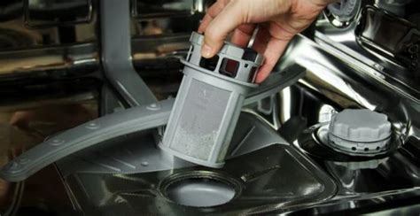 How to fix standing water in a dishwasher