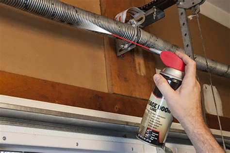 How to grease garage door. Apply Soap to the Door. Dip the soft-bristle brush or sponge into the soapy mixture and gently scrub the garage door. Work in small sections, starting from the top and working your way down. Apply light pressure and be thorough, paying attention to areas that are visibly dirty or stained. 