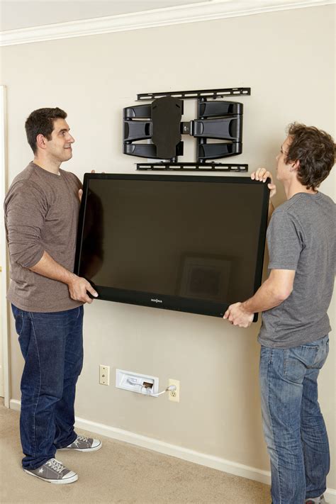 How to hang tv on wall. Always hang pictures at eye level — or about 57 to 58 inches above the floor. If hanging a picture over a sofa, don't leave a lot of wall space between the sofa and picture. Try for three to six inches. If you go any higher, the viewer's eye will just go to the wall, not the picture. 