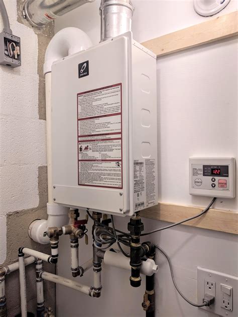 How to install a hot water heater. With the recirculation pump, the cooled off hot water is just sent back to the water heater (through the cold water line) and very quickly replaced with hot water instead of being dumped down the drain. The result is hot water with very little wait time, around 60 to 80 percent faster than standard water heater configurations. 