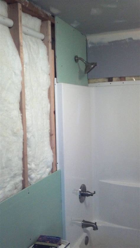 How to install a shower surround over drywall.  Selecting the correct backer b...
