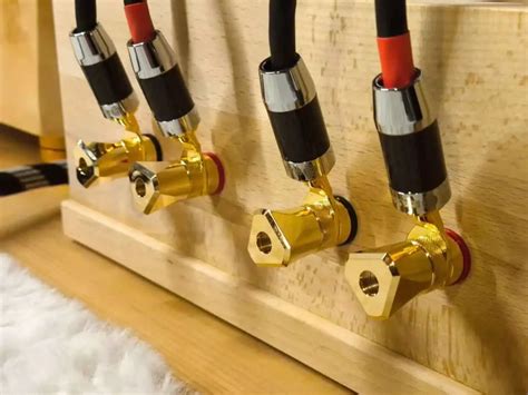 How to install binding posts. . I.  Insert long threaded end of binding posts into the holes on ...
