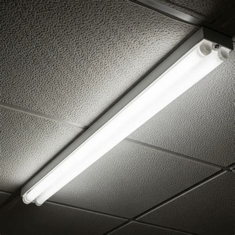 How to install fluorescent light covers.  With the right tools, materials, and step-by-step gui...