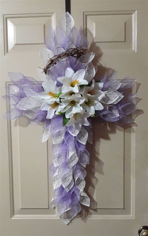 Feb 12, 2024 - Discover unique 2024 Easter cross wreath designs to adorn your front door. Find easy DIY tutorials for homemade deco mesh wreaths and budget-friendly Dollar Tree crafts. Perfect for spring and Easter decor, these wreaths are sure to add festive charm to your home..