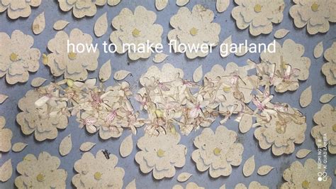 How to make flower garland with needle.  Measure and cut two separate strings of...