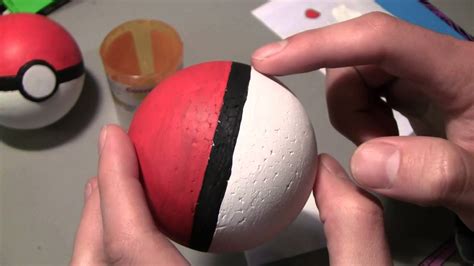 How to make pokeball. Paint one side of each ball with red paint. For me each ball needed two coats of paint. Remove your painters tape and get ready to add your dots. You can do this in 1 of 2 ways. Cut a vinyl black circle and apply it centered over the red and white line split. Then cut a slightly smaller white circle and place it in the center of the black dot. 