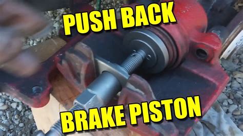 How to push rear brake piston in
