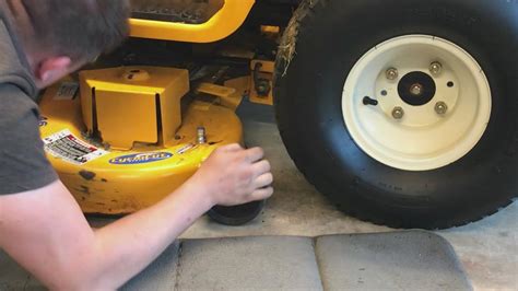  This video will show you how to safely replace the deck belt on a Cub Cadet riding mower. The deck belt connects the crank shaft to the mower blades, causing them to turn. Consider a riding lawn mower belt replacement if you notice cracks forming in the rubber. . 