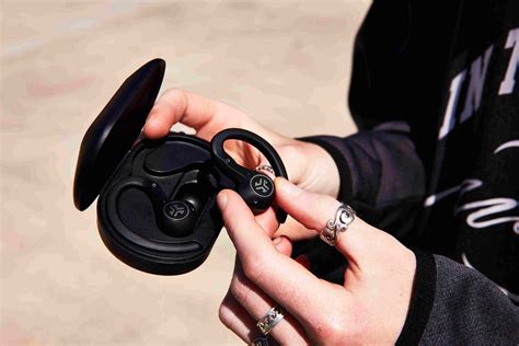 How to put earbuds in