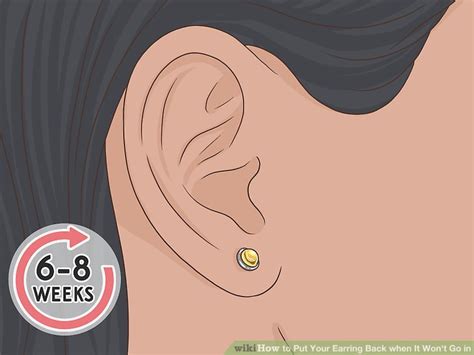 How to put your earring back in