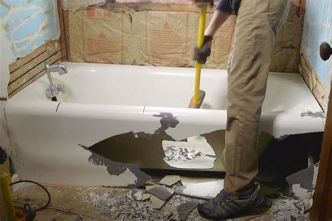 How to remove a cast iron tub. The demolishing of a cast-iron tub courtesy of R.C.W! 
