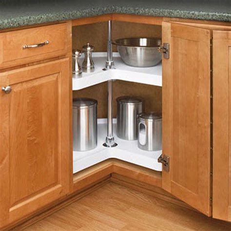 How to remove a lazy susan. Replace the Cabinet If your cabinet has multiple decades of use or you can't find an easy fix, it might be more cost effective to replace the entire cabinet. To remove the old cabinet, you'll need to look for a bolt, usually located close to the top of the pole, and remove it. 
