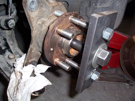 Below are 10 ways you can loosen a stuck wheel bearing. We recommend following these steps in order, as some methods are only useful depending on how stuck the wheel bearing is. How to remove wheel hub without a puller. Can you remove a wheel hub without puller? 1. Tap the Back of the Wheel Hub with a Hammer.. 