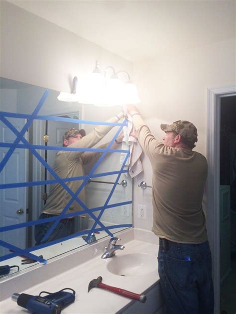 How to remove bathroom mirror. In this video we show you how to remove your old bathroom mirror frame and how to add a new one. It can be tricky to remove a frame, especially if it was glu... 