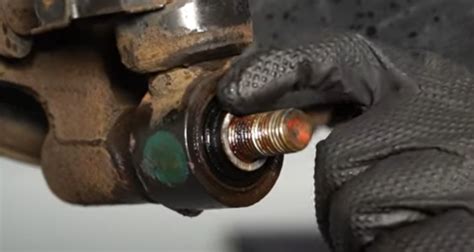 How to remove bolt stuck in bushing