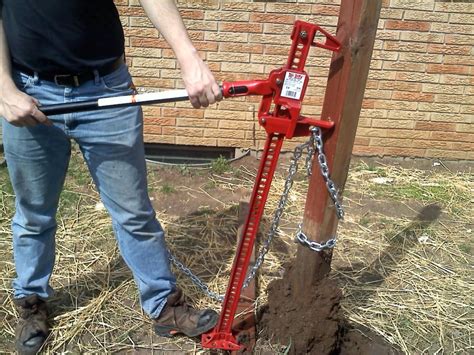 Learn how to use a farm jack to remove a fence post easily and safely in this video tutorial. Watch the best tips and tricks for this DIY project.
