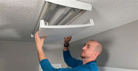 How to remove fluorescent light cover without clips.  Cut and tape into place. Th...