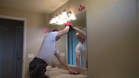 How to remove mirror glued to wall. Repairing the wall basically means cutting off the remaining chunks of adhesive, normally something like Liquid Nails. It's just scraping and minor patching with joint compound, then sanding. Bigger areas of damaged can be repaired too. If you want to start fresh with drywall removal, that's not rocket science either. 