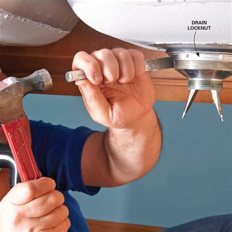 How to remove sink drain. Slide a slip nut and washer onto the straight end of the trap arm. Push the trap bend up into the tee fitting on the tailpiece while sliding the trap arm into the drain outlet at the wall. Adjust the trap pieces as needed to create the most direct path from the sink to the drain outlet. 