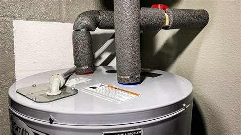 How to replace a hot water heater. Turn the knob clockwise until it tightens. Drain the supply lines by running both hot and cold water into the kitchen sink. Allow hot and cold to run for a few minutes each. Pull up on the pressure release valve. Hold the lever up for a few seconds to allow the inner tank pressure to subside. 