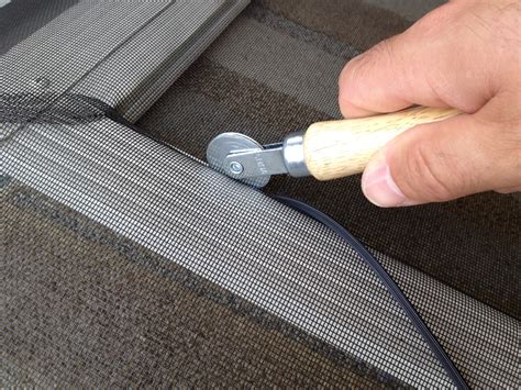 How to replace screen door mesh. Photo 1: Lower the door. Turn the adjustment screws counterclockwise to release tension on the wheels and lower the door. There’s an adjustment screw for each wheel near the corners of the … 