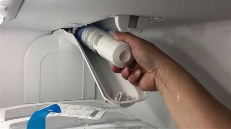 How to replace water filter in whirlpool fridge. Step 3: Reset the filter light. Locate the reset button, usually found beneath the status light on the control panel. Press and hold the button for three seconds or until you hear a beep or chirp. Once the appliance makes a noise, you can release the button and close your fridge. 