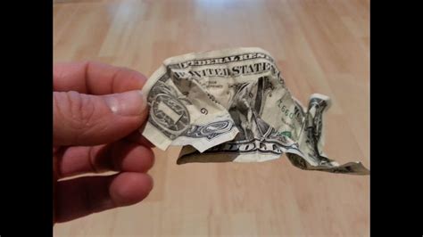 How to straighten and uncrease a wrinkled dollar bill