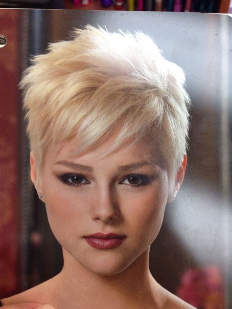 How to style pixie cut fine hair. 25. Cropped Pixie Bob with Short Bangs. If you like a messy and tousled look, try a layered pixie bob cut with full choppy bangs. Rub a pea-sized amount of texturizing cream between your palms and run your fingers against the hair growth direction. @hirohair. 