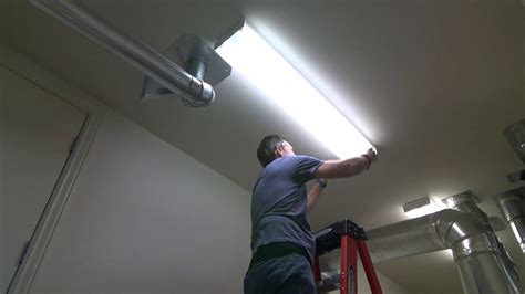 How to take off a fluorescent light cover. I want to install the new under cabinet LED lights provided to me from GetInLight, but before I can do that I had to first uninstall the old fluorescent tube... 