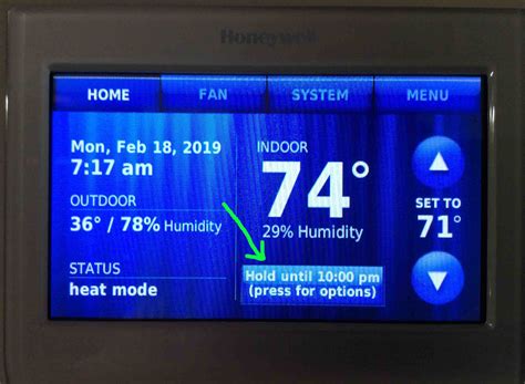 Press the "Menu" button on your thermostat. Select "