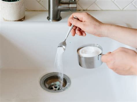 How to unclog a tub. Here are a few naturals to try. First, you’ll have to remove any standing water in the bathtub using a wet vac or a sponge and bucket. With the water out of the way, you’re ready to begin. Take one cup of baking soda and pour it down the drain. Use a funnel if necessary to make sure it all goes in. 