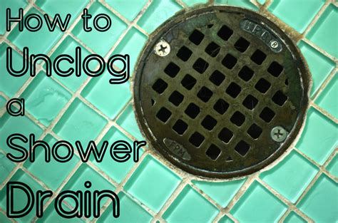 How to unclog shower drain. Put on rubber gloves. Run the cable on a small drain snake into the drain opening until it meets resistance. Tighten the cable clamp, then rotate the handle slowly to spin the cable in the drain opening. The cable should begin to auger itself down further into the drain. Do not force it too vigorously, or the cable may double back on itself. 