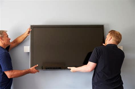 How to unmount a tv. Don’t tighten them too much, and do not use the drill on the TV. Attach the bracket to the wall. Use a stud finder to locate the studs in the wall that will hold your TV. Mark the locations with a pencil. Use a drill to attach the wall bracket plate. Screw the bolts provided in the wall mount kit. Connect the cables. 