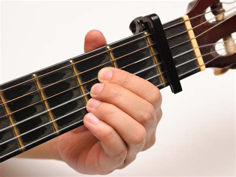 How to use a capo made easy a step by step guide to using a capo like a pro. - Star trek roleplaying game players guide.