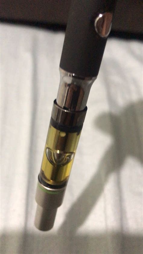 Press and inhale. Most vape batteries will have a small button.Put the cartridge to your lips, much like a straw, and press the button, taking a slow, steady inhale. You should see the battery light up and begin to feel vapor pulling in. You should see a small amount of vapor when exhaling.. 