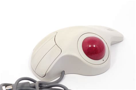 How to use logitech trackman marble mouse.  Use, utilize mean to make something serve one...