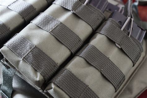 How to use molle webbing.  This guide explains how MOLLE webbing lets users attach pouches and L...