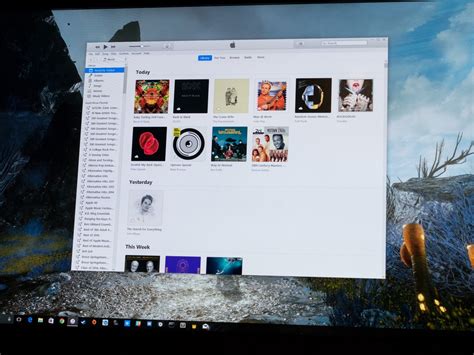 How to view photos in itunes library